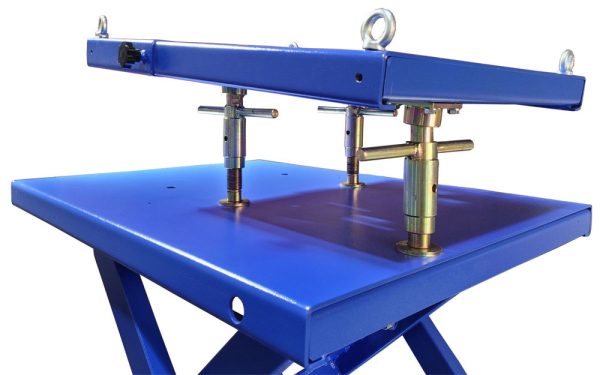 The iDEAL LT-PT3300DC-X is a 3,300 lb. portable, high-rise commercial / industrial grade 12V DC battery powered electric-hydraulic lift table, incorporating a multi-adjustable powertrain platform primarily designed to assist with controlled lifting & lowering tasks to safely remove, replace or service heavy vehicle powertrain components such as engines, transmissions, drive-axle & transaxle assemblies, or other similar heavy components. The LT-PT3300DC-X comes standardly equipped with a durable powertrain platform that includes extendable length, tilt & height adjustments, while also incorporating a fully operational remote hand controller & control box panel buttons for dual operational control operations. Also included is a high quality deep-cycle 12V DC sealed battery, integrated battery charger and 12V DC auxiliary outlet port. In addition, the iDEAL Powertrain 3300 lb. lift table comes standard with a pallet jack dolly with poly casters, leg support stands, front locking swivel & directional poly casters, tool tray, double lift scissors, powerful DC electric motor, dual hydraulic cylinders, tie-down anchors, and heavy duty ratchet strap. Optional Accessories include a ‘quick mount’ PT Support Stand Kit & 12V DC LED Spot Light with magnetic base. - Image 10